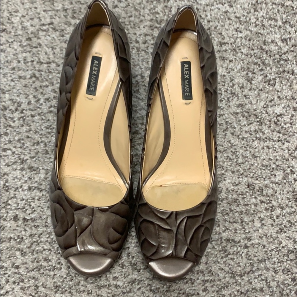 Multi colored heel. Great condition!  Peep toe!